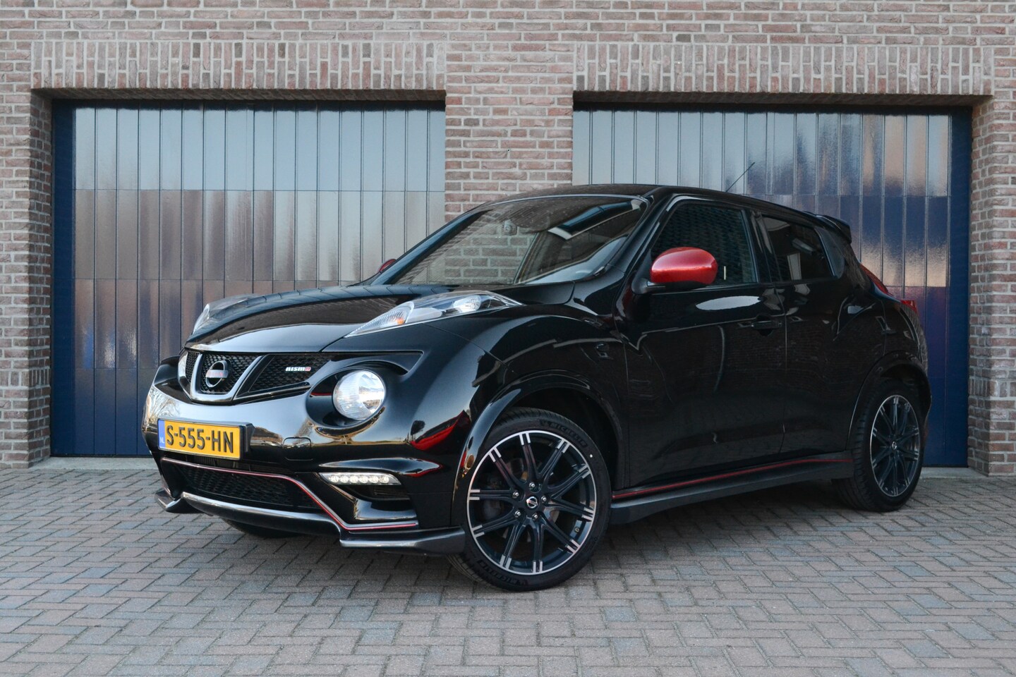 Nissan Juke - 1.6 Turbo NISMO All-Mode Automaat 4WD | Camera | Keyless | Stoelverwarming | Navigatie | A - AutoWereld.nl