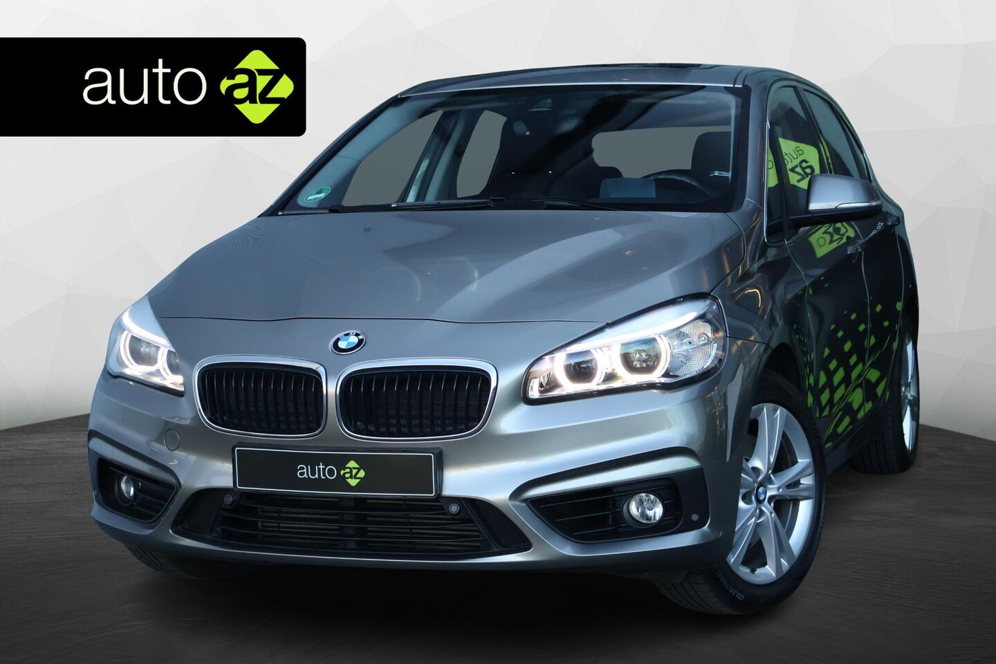 BMW 2-serie Active Tourer - 218i Essential / Panorama / Trekhaak - AutoWereld.nl