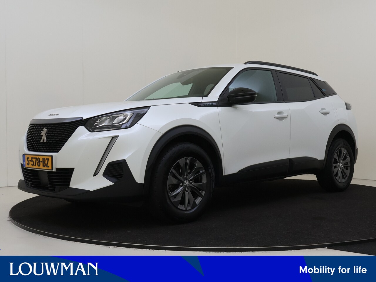 Peugeot 2008 - 1.2 PureTech Style | Navigatie | Camera | LM velgen | Cruise Control | Climate Control | - AutoWereld.nl