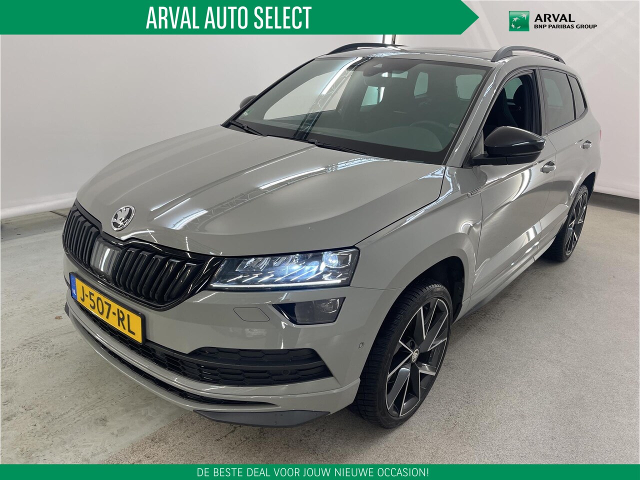 Skoda Karoq - 1.5 TSI ACT 150pk Automaat Sportline Business | Panoramadak | Trekhaak | Functiepakket | 1 - AutoWereld.nl