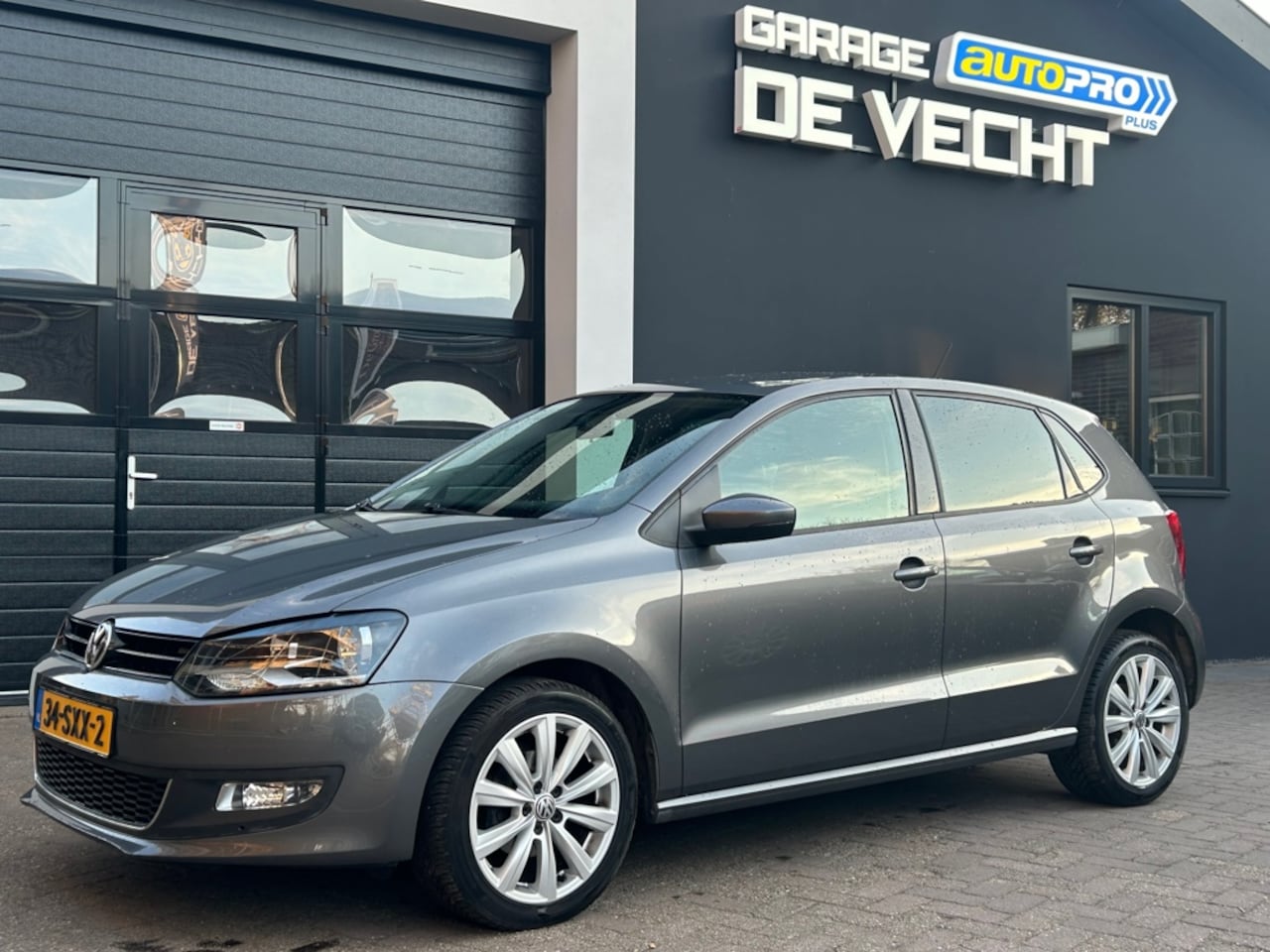 Volkswagen Polo - 1.2 TSI 5drs Highline NAVI/AIRCO - AutoWereld.nl