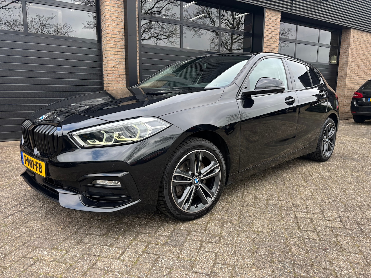 BMW 1-serie - 118i High Executive Automaat - AutoWereld.nl