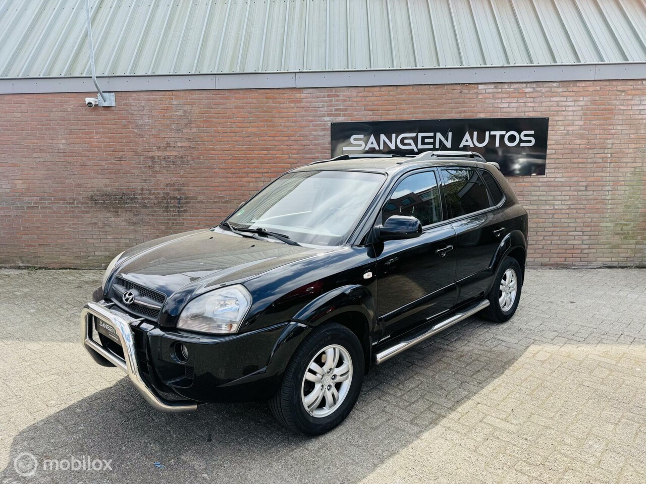 Hyundai Tucson - 2.0i Style Premium Leer Clima Nap Trekhaak - AutoWereld.nl