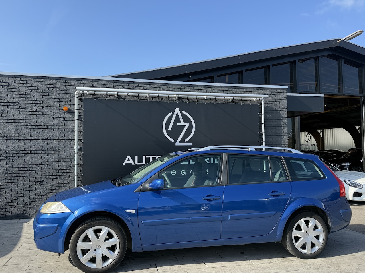 Renault Mégane Grand Tour - 1.6-16V Business Line panorama dak - AutoWereld.nl