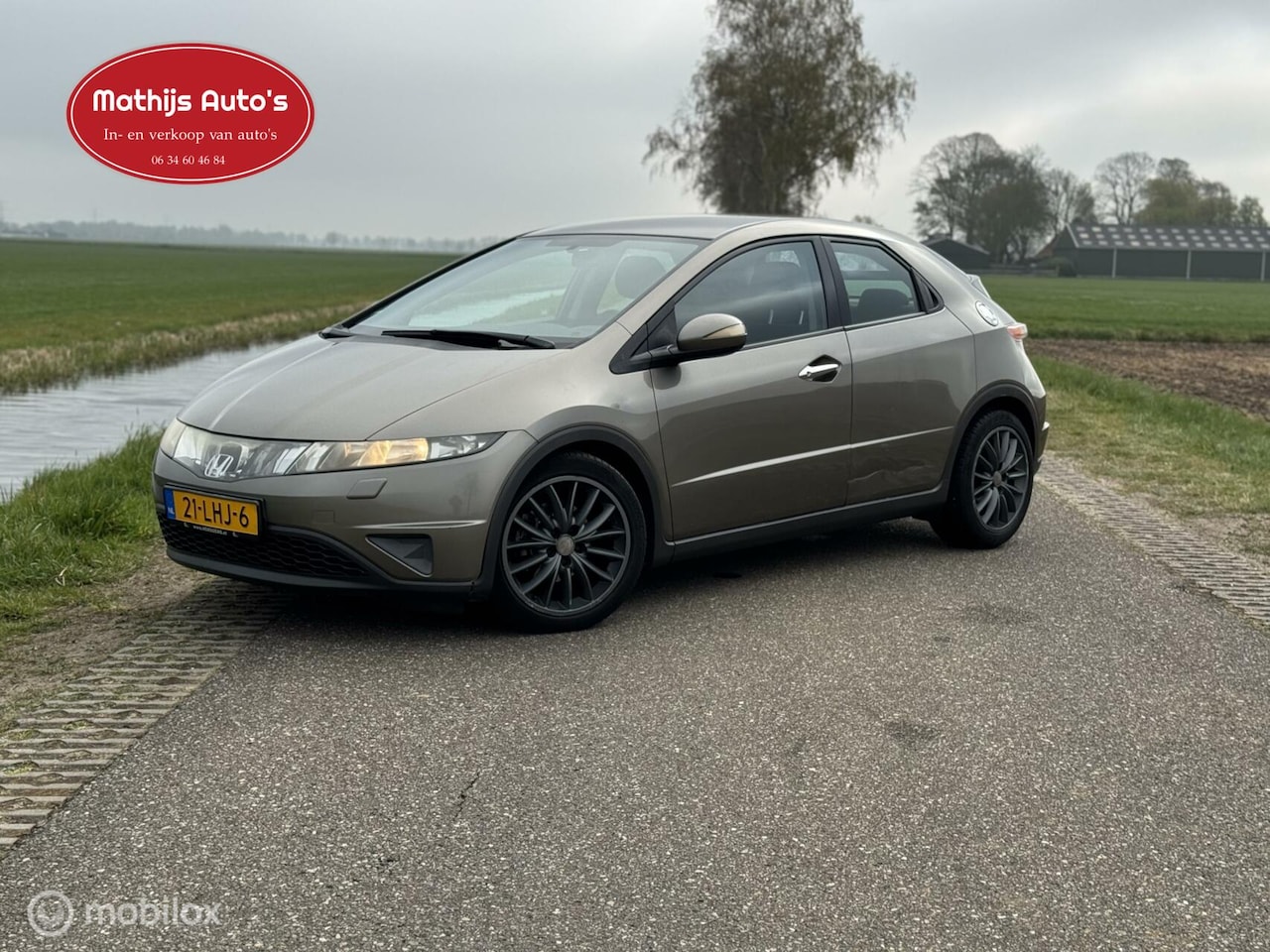 Honda Civic - 1.8 Comfort Navi Clima! Nieuwe APK! - AutoWereld.nl