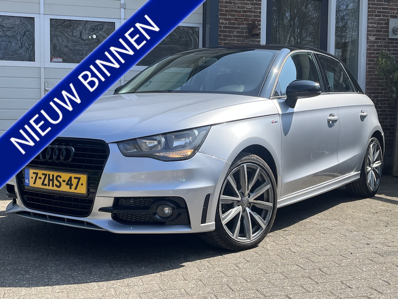 Audi A1 Sportback - 1.2 TFSI Admired '14 Navi S-Line Airco - AutoWereld.nl