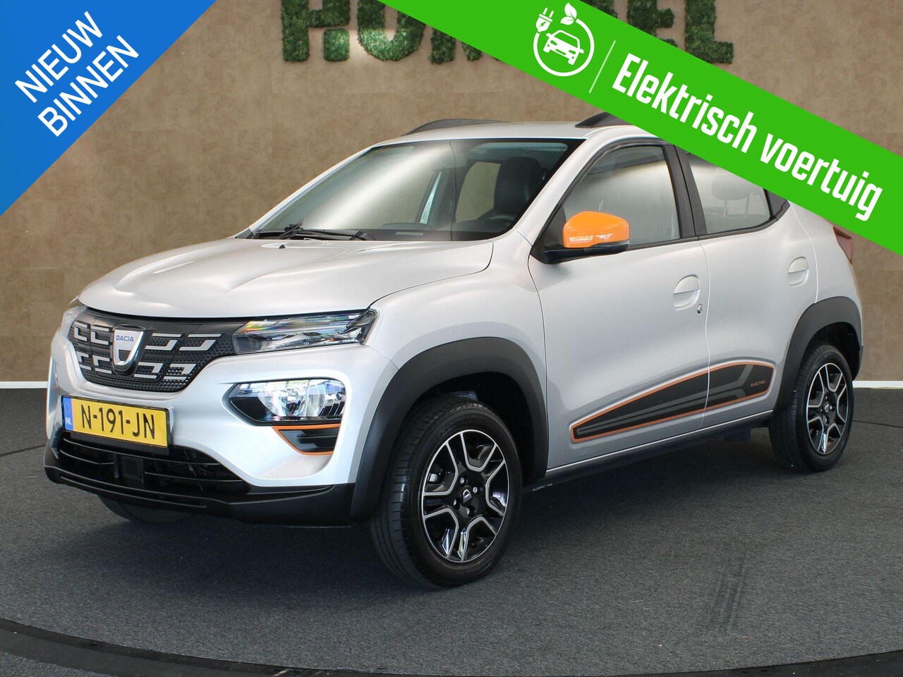 Dacia Spring - Comfort Plus (Orange Pack) 27 kWh - ORIGINEEL NEDERLANDSE AUTO - SOH 93% - ACHTERUITRIJ CA - AutoWereld.nl