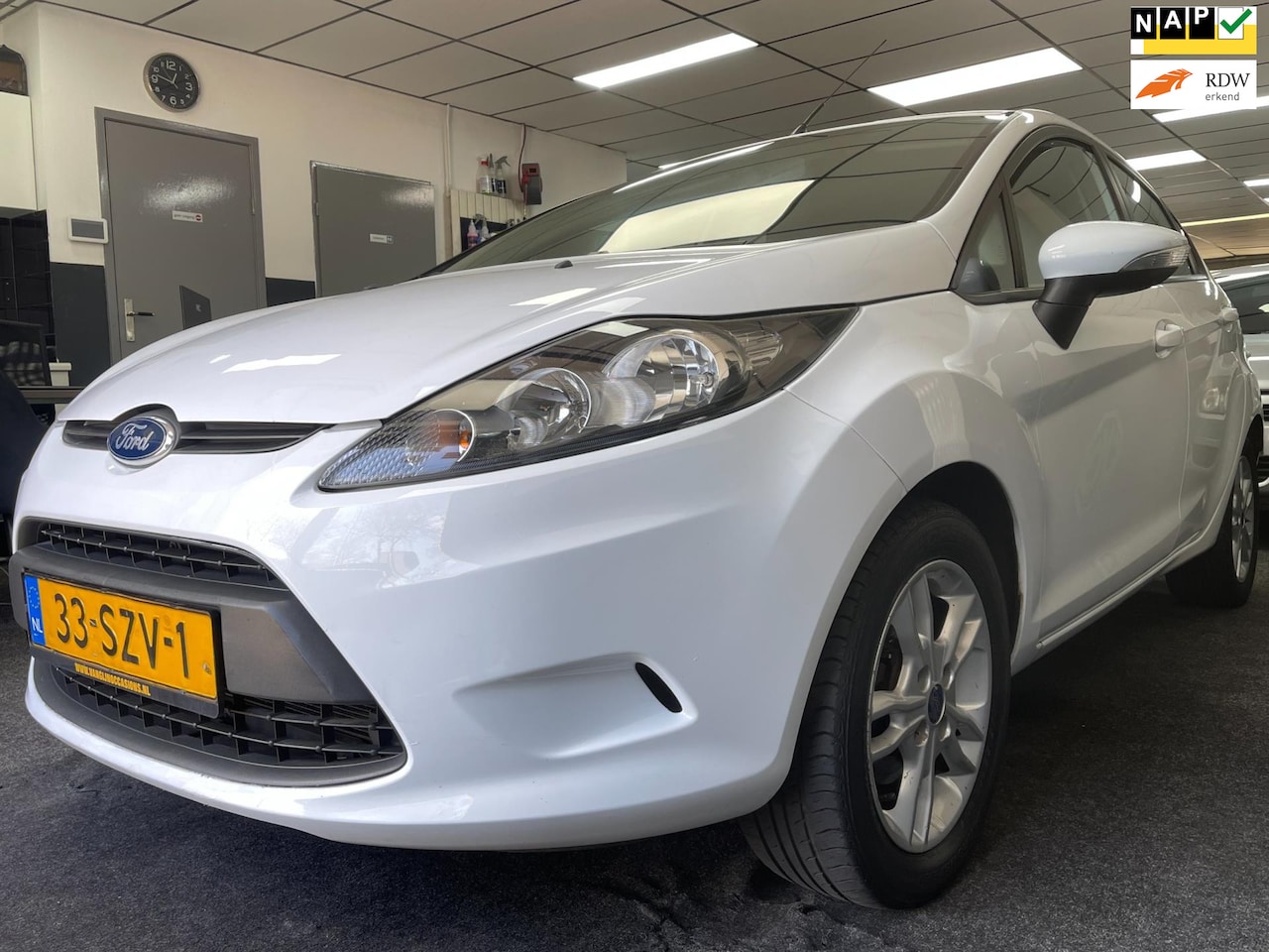 Ford Fiesta - 1.25 Ghia 1.25 Ghia - AutoWereld.nl