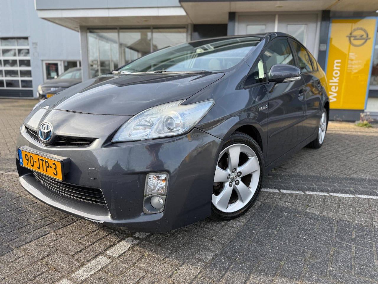Toyota Prius - 1.8 Aspiration | Clima | LMV | Trekhaak | - AutoWereld.nl