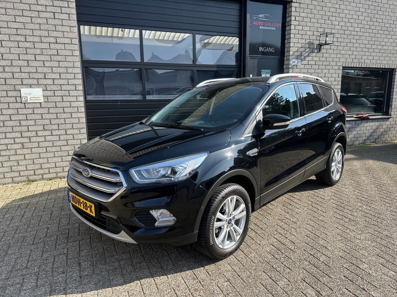 Ford Kuga - 1.5 EcoBoost Titanium *NAVIGATIE*CAMERA*AIRCO*CRUISE-CONTROL* - AutoWereld.nl