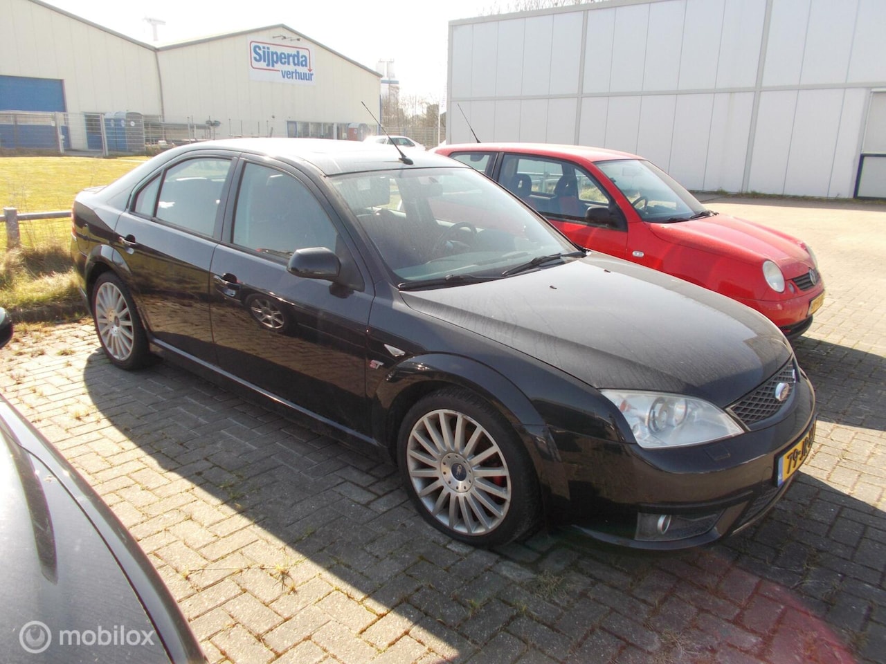 Ford Mondeo - 3.0 V6 ST220 3.0 V6 ST220 - AutoWereld.nl