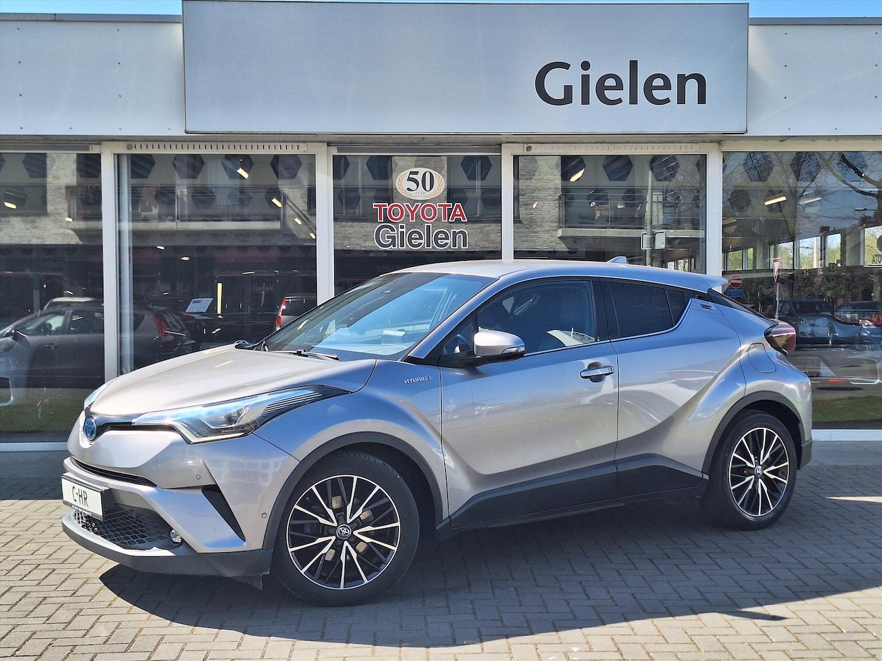 Toyota C-HR - 1.8 Hybrid Executive | LED Pakket, Dodehoekherkenning, Navigatie, Stoel + Stuurverwarming, - AutoWereld.nl