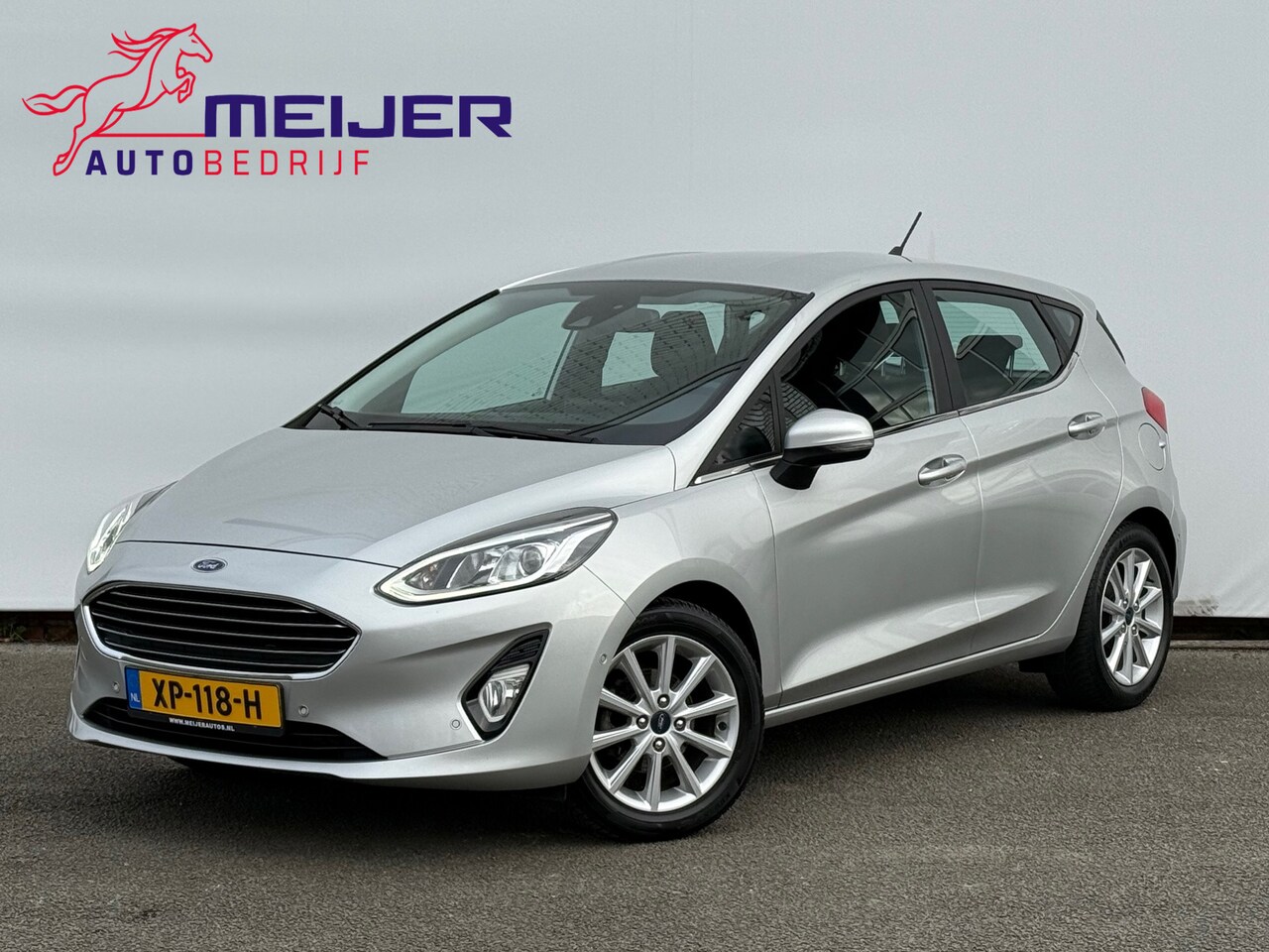 Ford Fiesta - 1.0 EcoBoost Titanium Sportvelgen | Parkeersensoren | Cruise | Clima | Navigatie | Camera - AutoWereld.nl