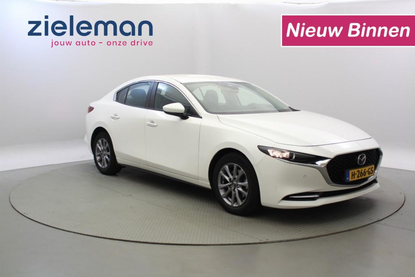 Mazda 3 - 2.0 e-SkyActiv-X M 180 - Parelmoer Wit, Leer, Camera, Xenon - AutoWereld.nl