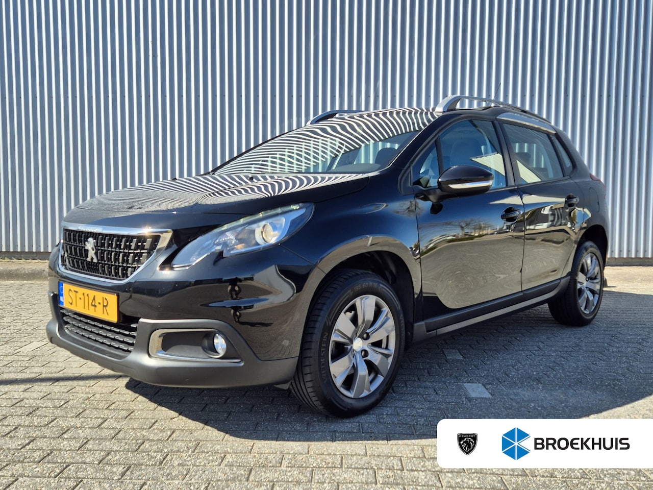 Peugeot 2008 - 1.2 PureTech Blue Lion | Airco | Cruise control | Dakrails - AutoWereld.nl
