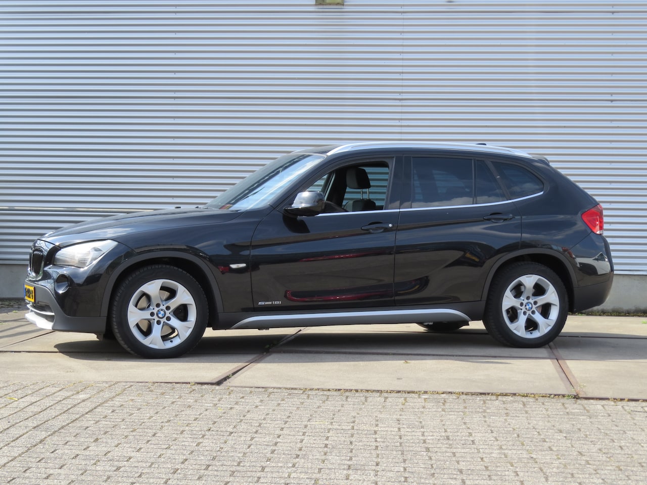 BMW X1 - 1.8i sDrive Executive - AutoWereld.nl