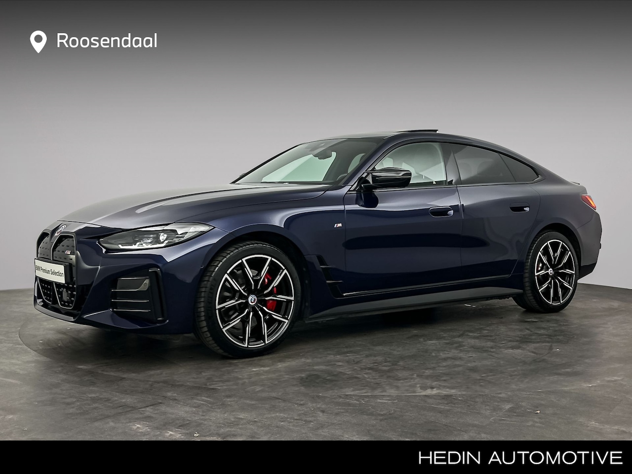 BMW i4 - M50 84 kWh M-Sport Pro | Schuifdak | Extra getint glas achter | Harman Kardon | Camera | - AutoWereld.nl