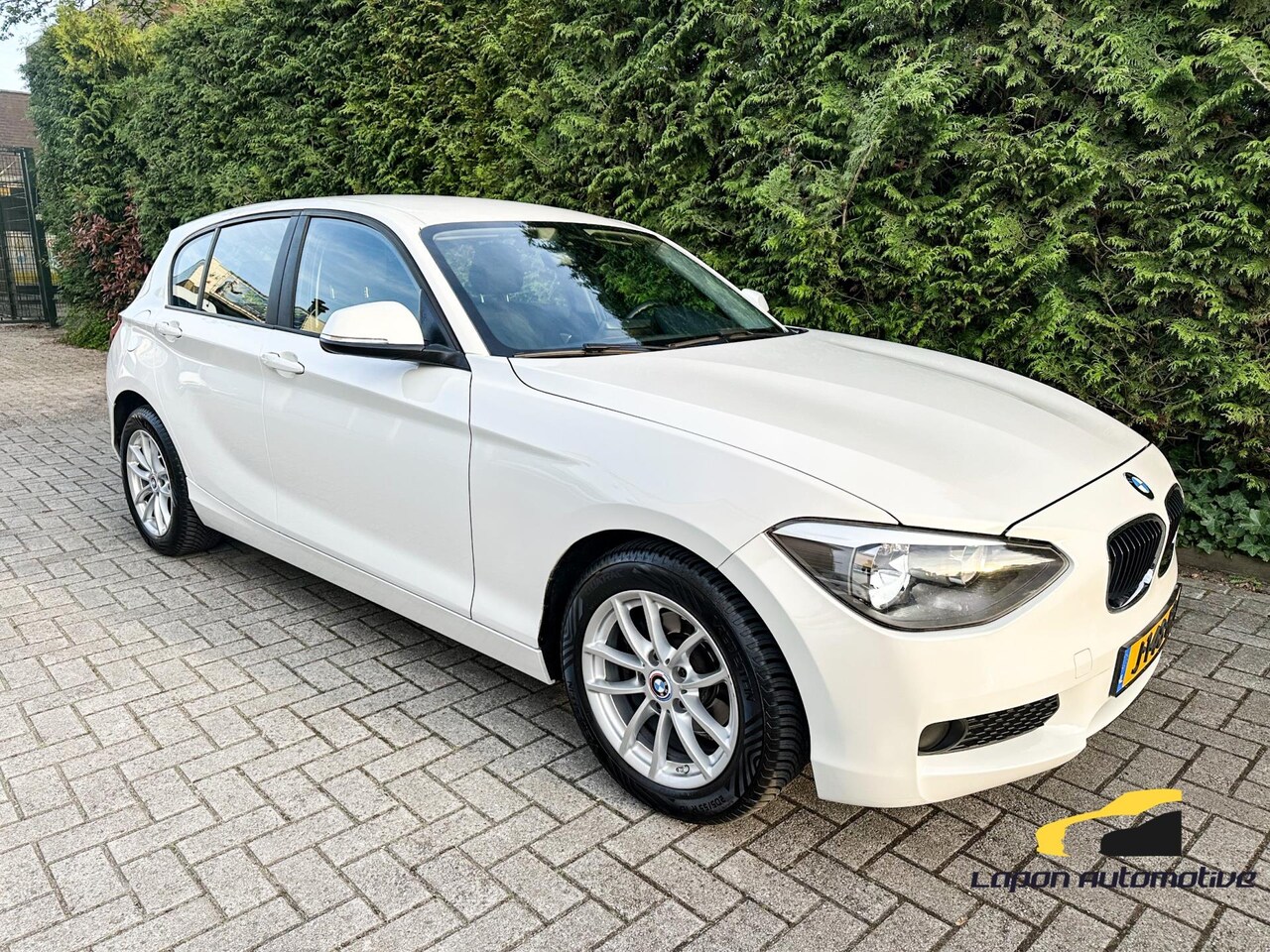 BMW 1-serie - 116i High Executive Automaat|Navi|PDC|Stoelverwarming - AutoWereld.nl