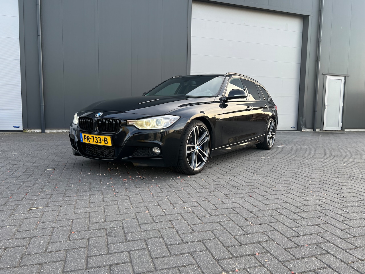 BMW 3-serie Touring - 330d High Executive - AutoWereld.nl