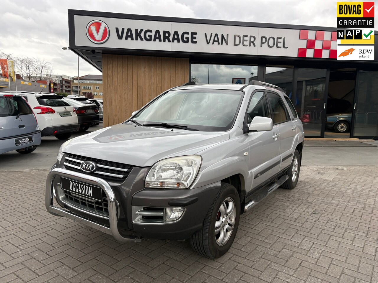 Kia Sportage - 2.0 CVVT Executive 2.0 CVVT Executive - AutoWereld.nl