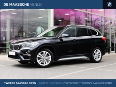 BMW X1 - sDrive20i High Executive xLine Automaat / Panoramadak / Trekhaak / Sportstoelen / Achterui