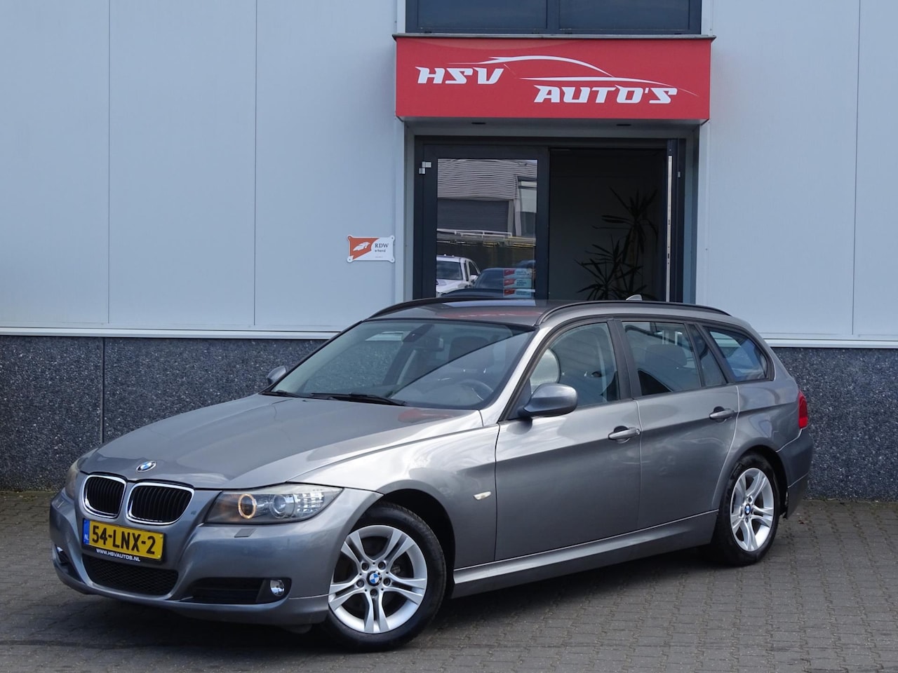 BMW 3-serie Touring - 318i Business Line navi LM airco - AutoWereld.nl