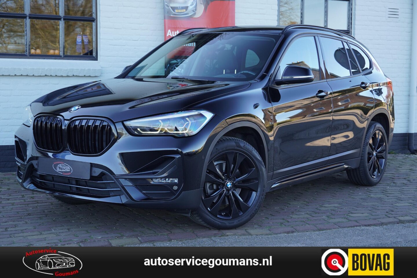 BMW X1 - sDrive18i Executive Edition Sport line Elek klep Navi LED Shadow Black - AutoWereld.nl