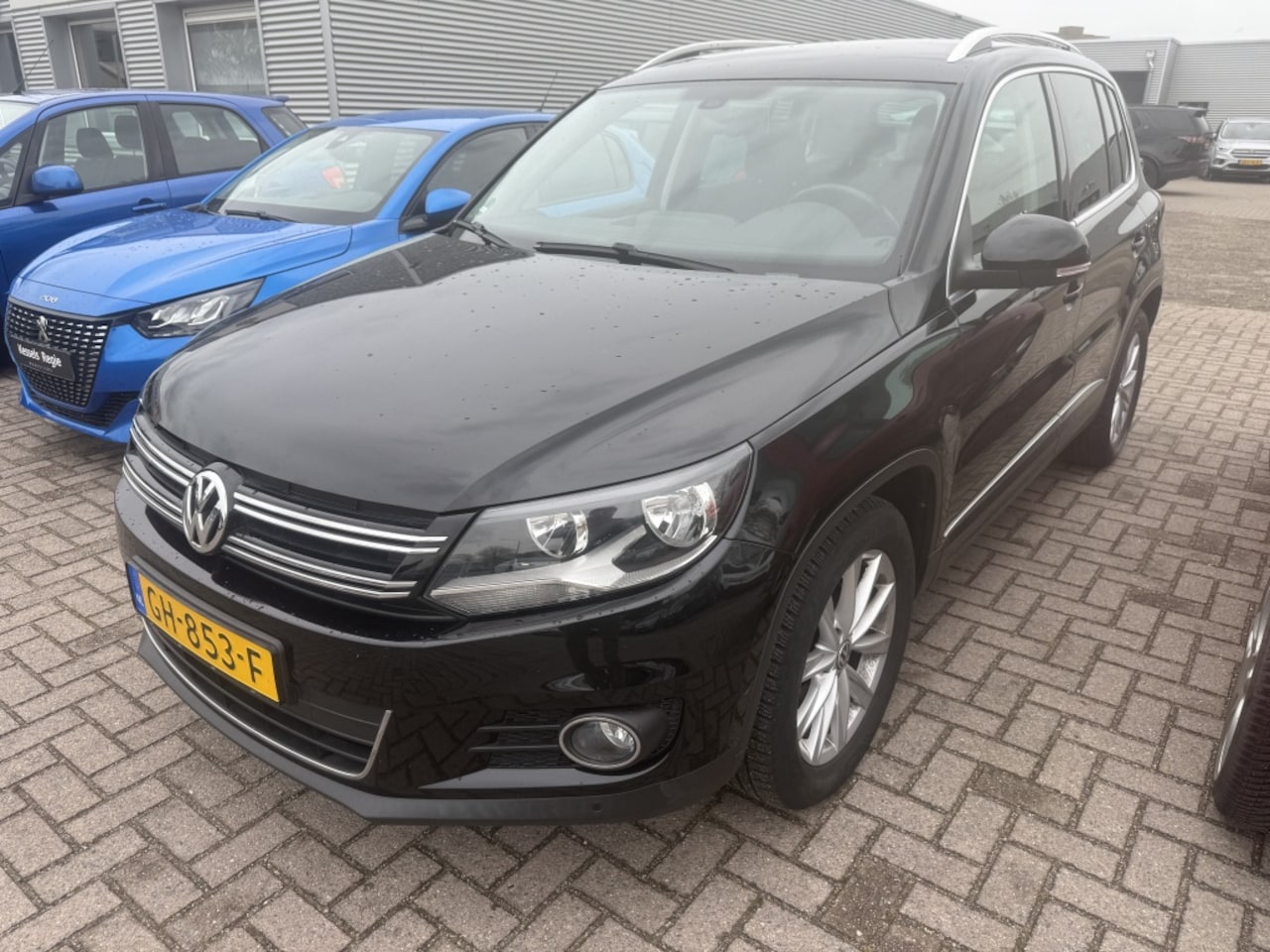 Volkswagen Tiguan - 1.4 TSI Sport&Style - AutoWereld.nl