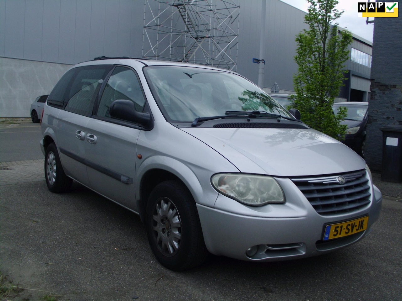 Chrysler Voyager - 3.3i V6 SE Luxe 7set automaat met airco - AutoWereld.nl