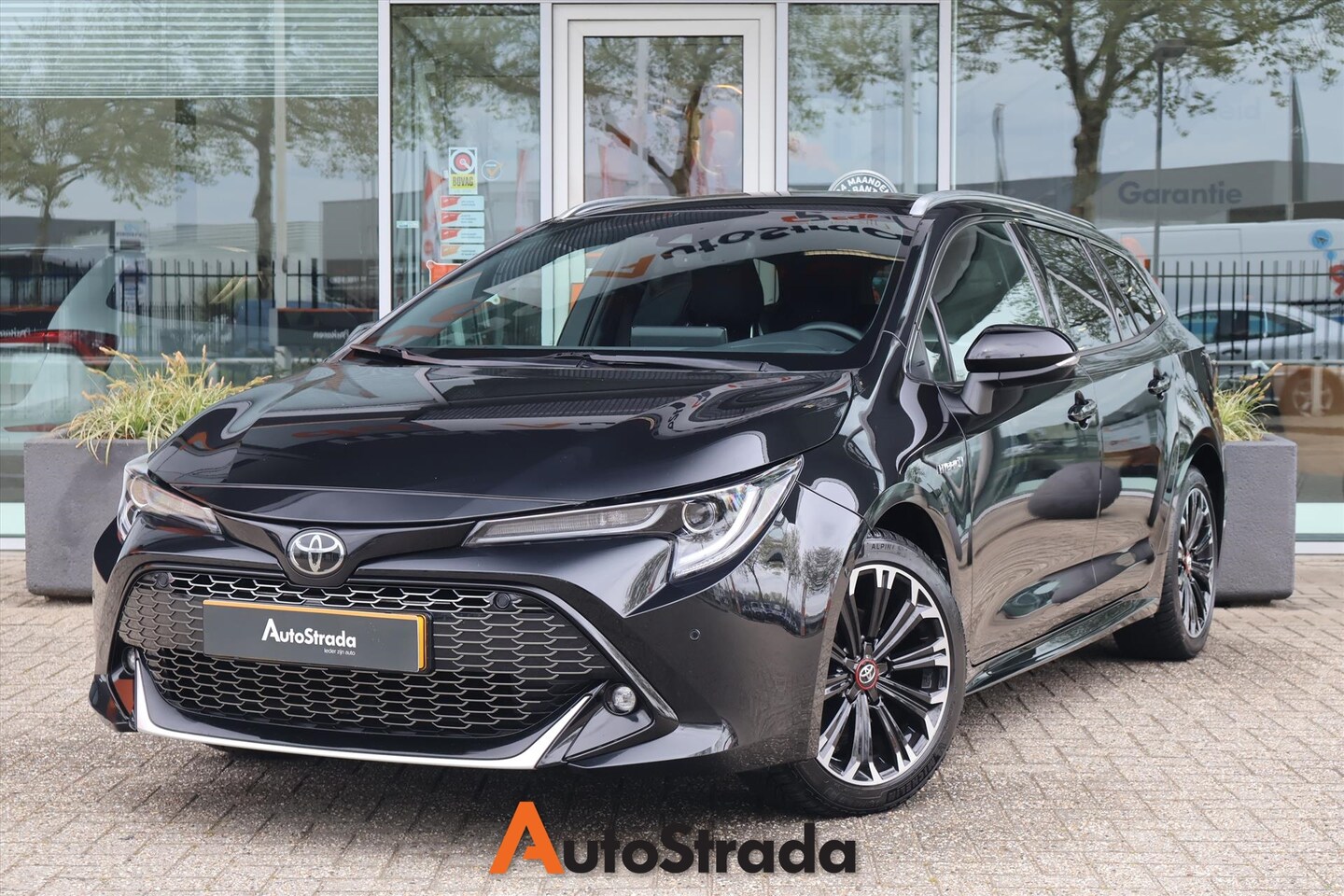 Toyota Corolla Touring Sports - 1.8 GR Hybrid 122pk | Keyless | Stoelverwarming | LED | Camera | DAB - AutoWereld.nl
