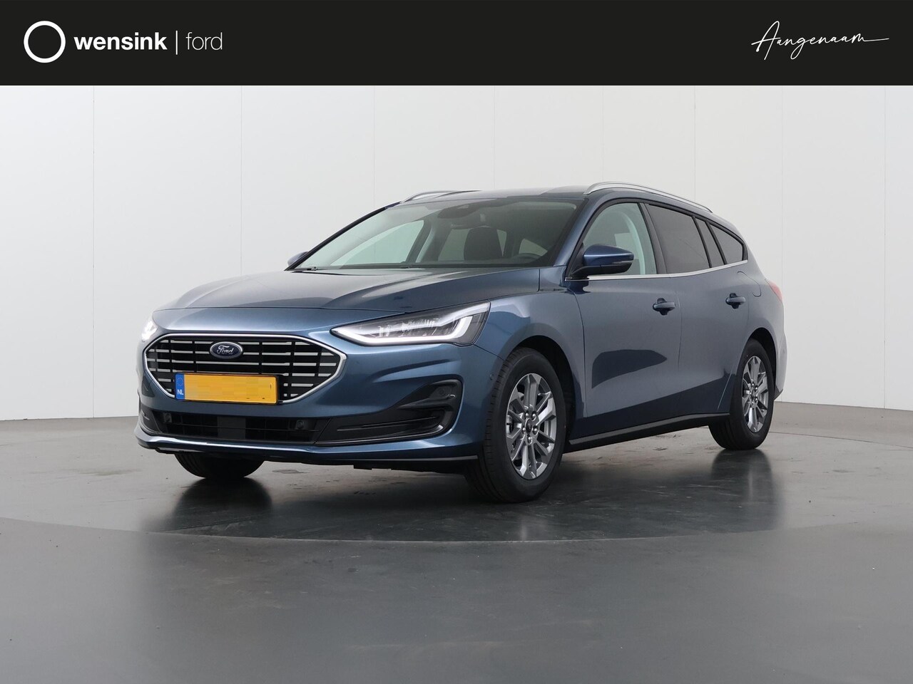 Ford Focus Wagon - 1.0 EcoBoost Hybrid Titanium PRIVATE LEASE VOORRAAD ACTIE - AutoWereld.nl