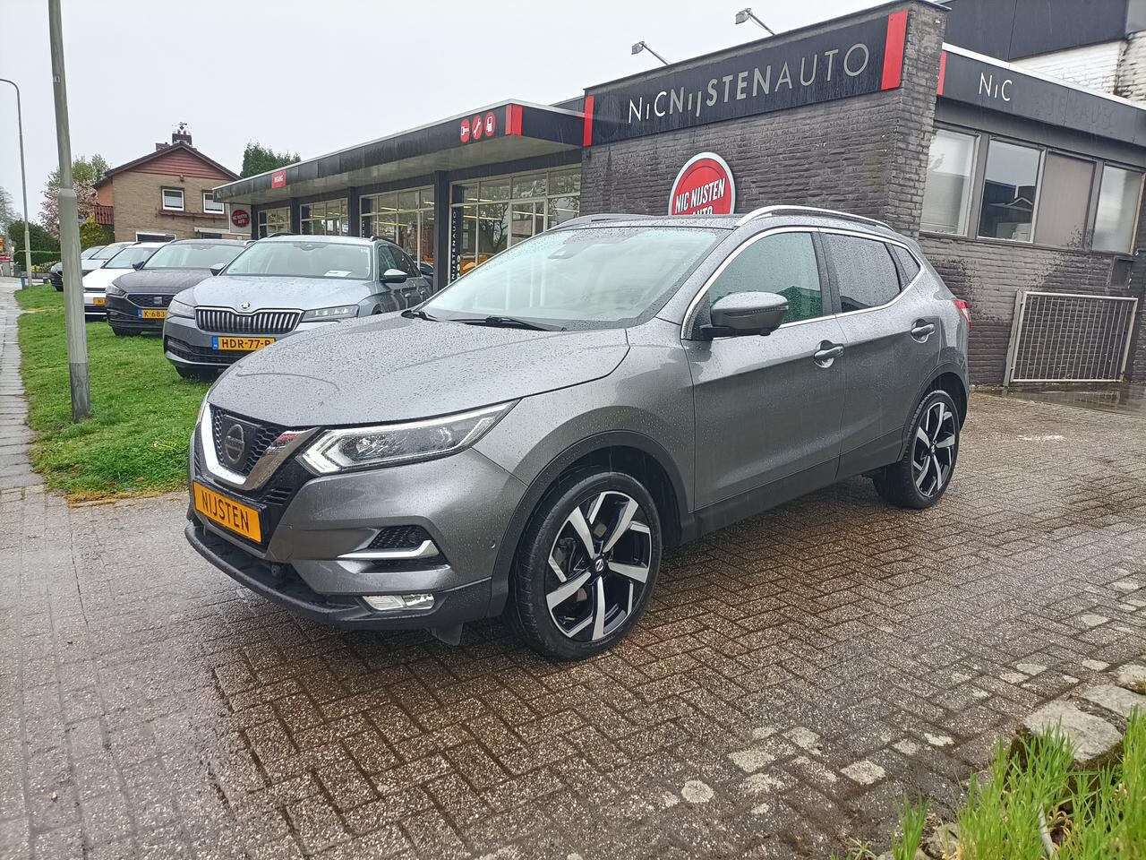 Nissan Qashqai - 1.2 DIG-T Tekna Pano,Cruise,Navi,Voorruitvw - AutoWereld.nl