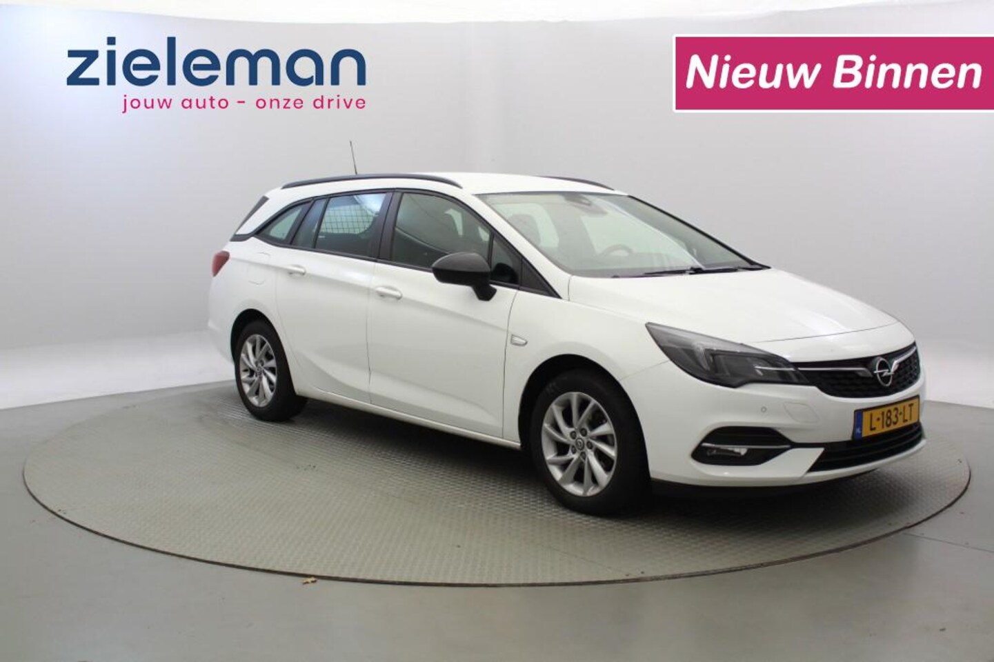 Opel Astra Sports Tourer - 1.2 Turbo Sports Tourer - CarPlay, Cruise, Trekhaak - AutoWereld.nl