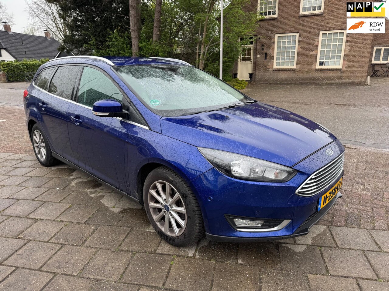 Ford Focus Wagon - 1.0 Titanium AUTOMAAT NAVI STUUR/STOELVERW. NWE D.RIEM 125 PK - AutoWereld.nl