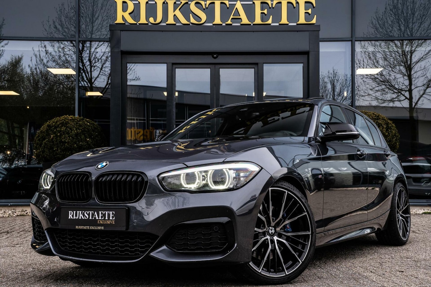 BMW 1-serie - M140i xDrive High Executive|H&K|REMUS|19'' - AutoWereld.nl