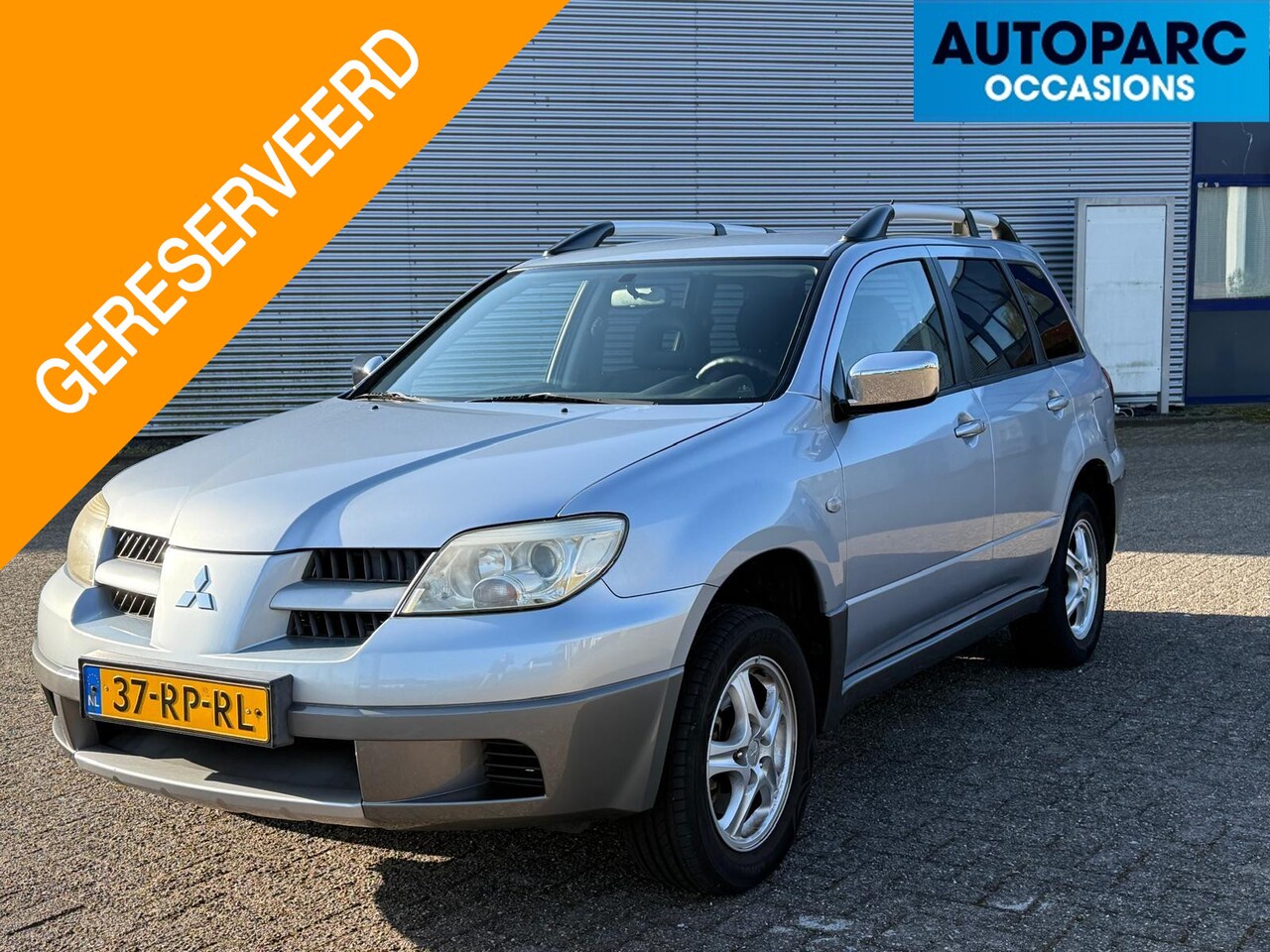 Mitsubishi Outlander - 2.0 Invite plus AIRCO, TREKHAAK, CRUISE CONTROL, GOED ONDERHOUDEN, NETTE AUTO. - AutoWereld.nl