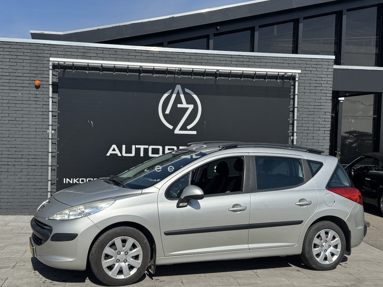 Peugeot 207 SW - 1.4 VTi X-line 1.4 VTi X-line - AutoWereld.nl