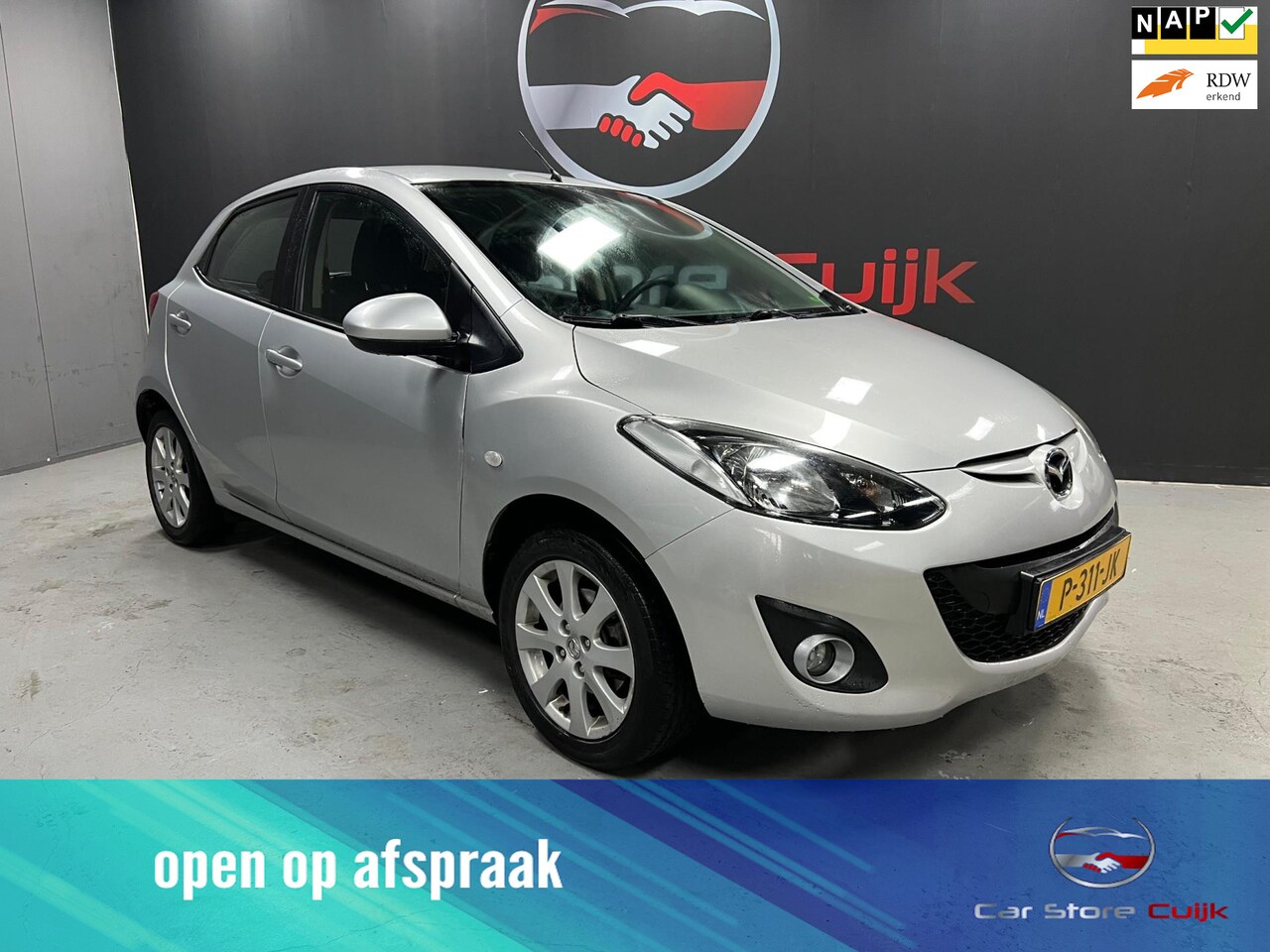 Mazda 2 - 1.3 TS Plus | Stoelverwarming | Airco | Inklapbare spiegels | - AutoWereld.nl
