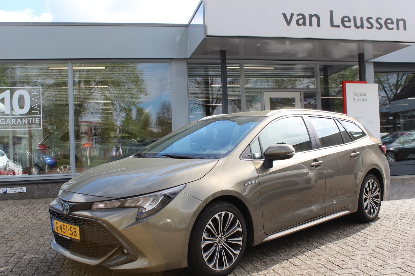 Toyota Corolla Touring Sports - 1.8 Hybrid DYNAMIC ALL SEASONS LED AD-CRUISE CLIMA APPLE/ANDROID - AutoWereld.nl