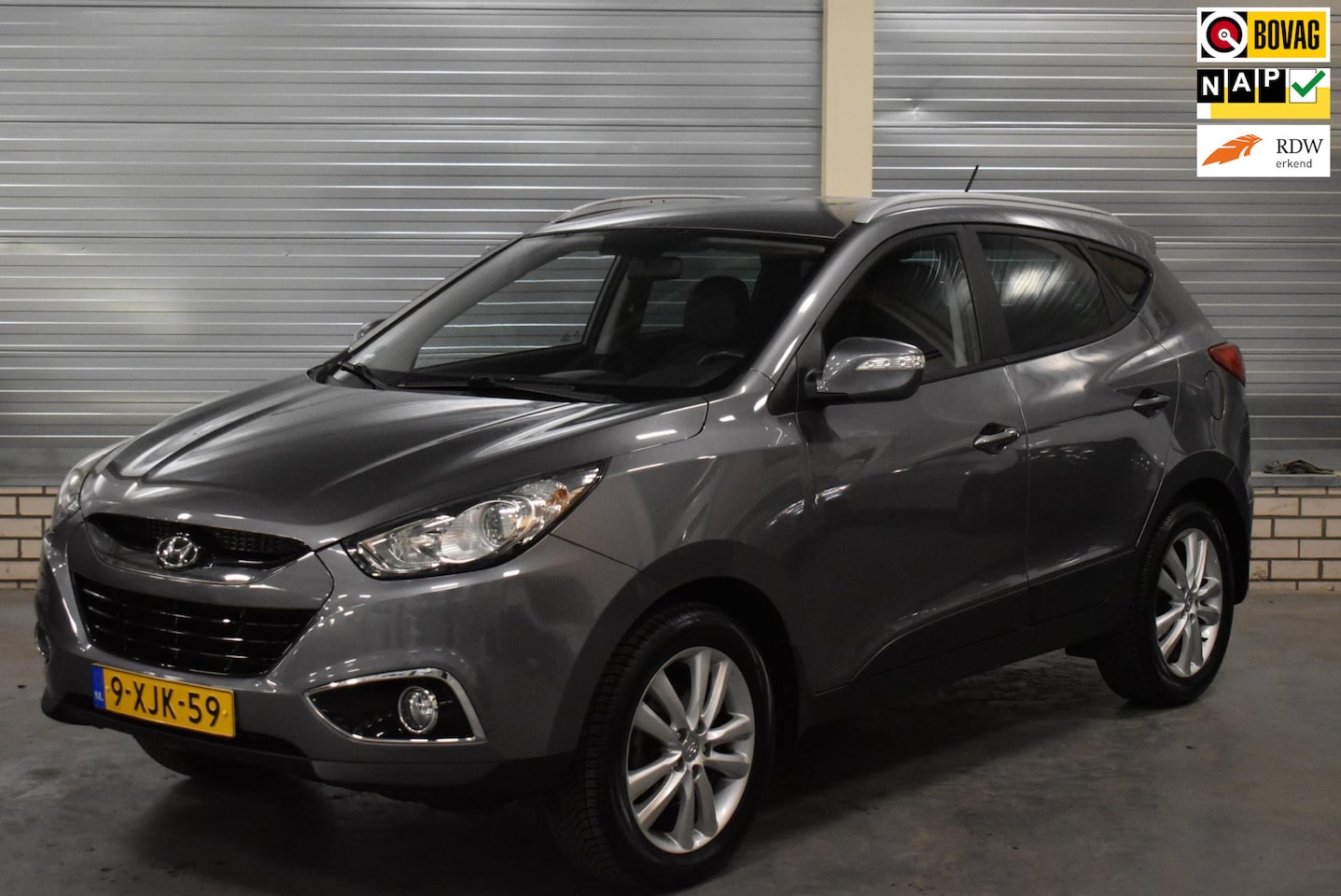Hyundai ix35 - 2.0i Active + Bluetooth|Stoelverwarming voor en achter|Half Leder|Trekhaak| - AutoWereld.nl