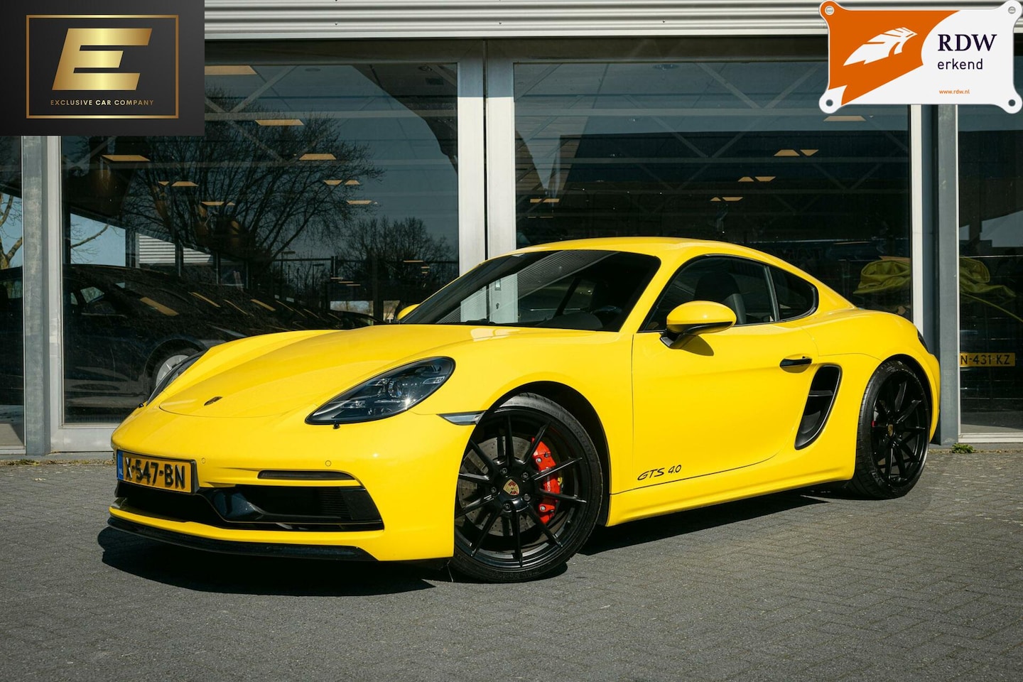 Porsche 718 Cayman GTS - 4.0 | Racing Yellow - AutoWereld.nl