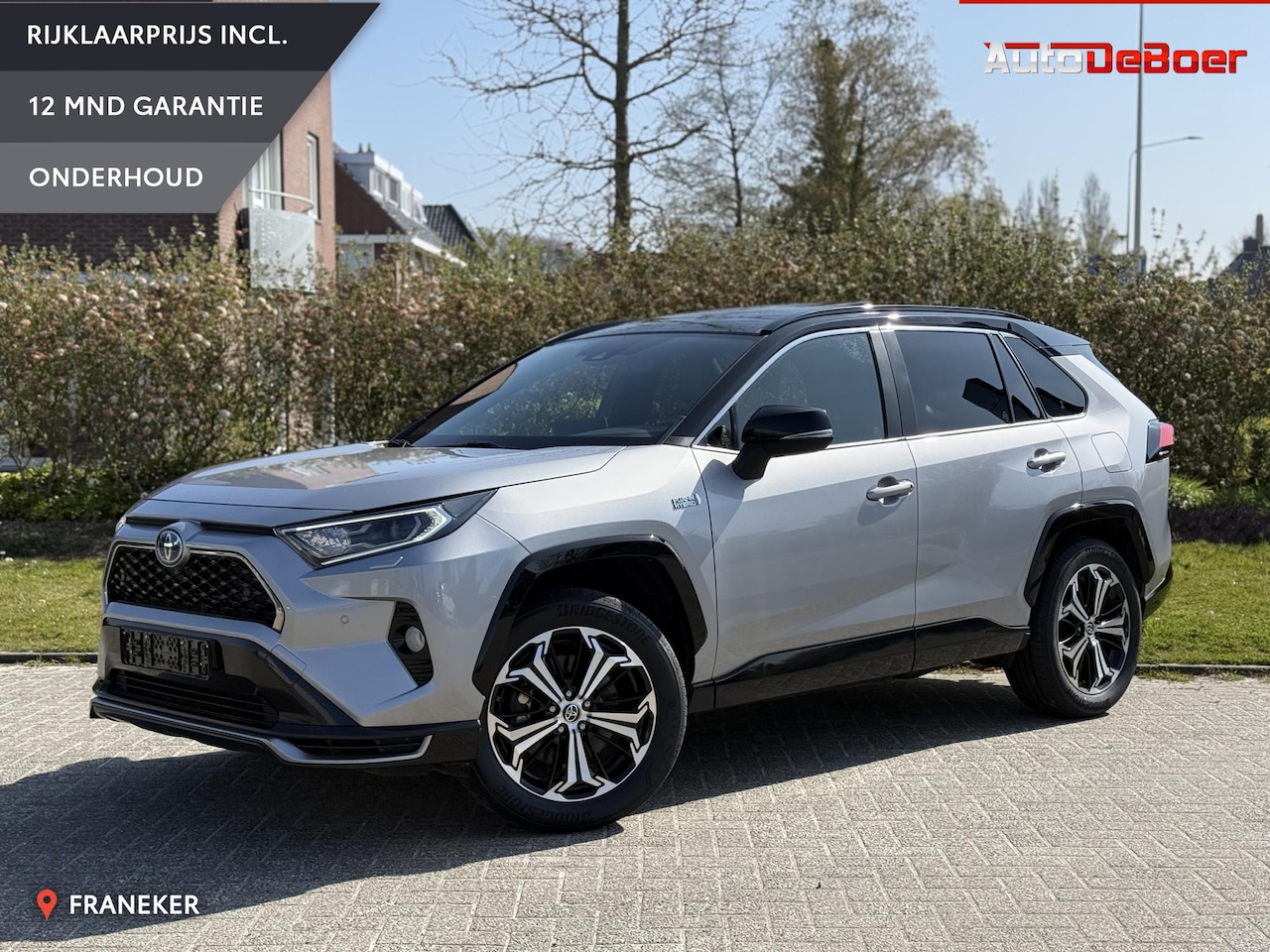 Toyota RAV4 - 2.5 Plug-in Hybrid AWD Bi-Tone Plus Trekhaak | Pano | Stoel- stuurverwarming - AutoWereld.nl