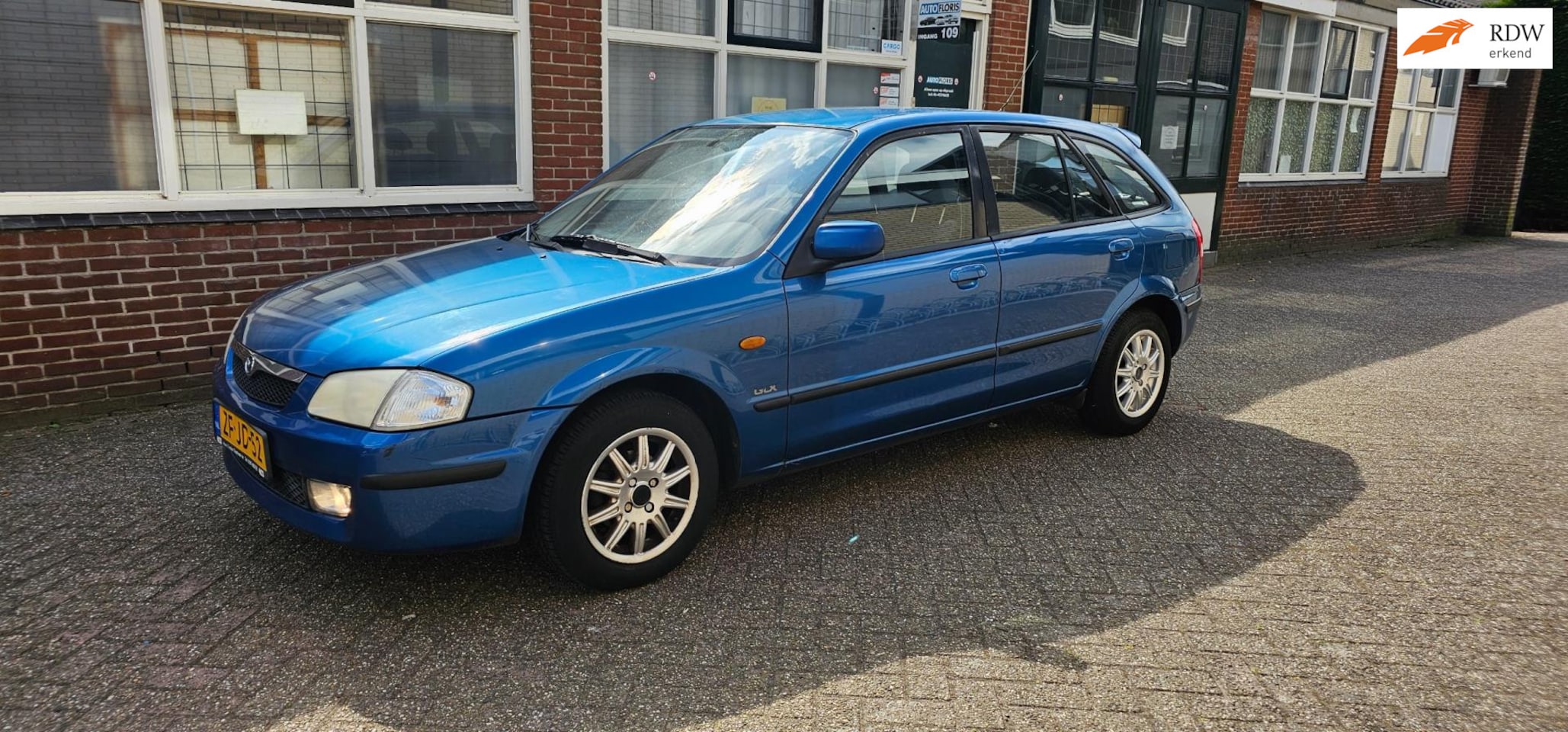Mazda 323 Fastbreak - 1.3i GLX airco apk - AutoWereld.nl