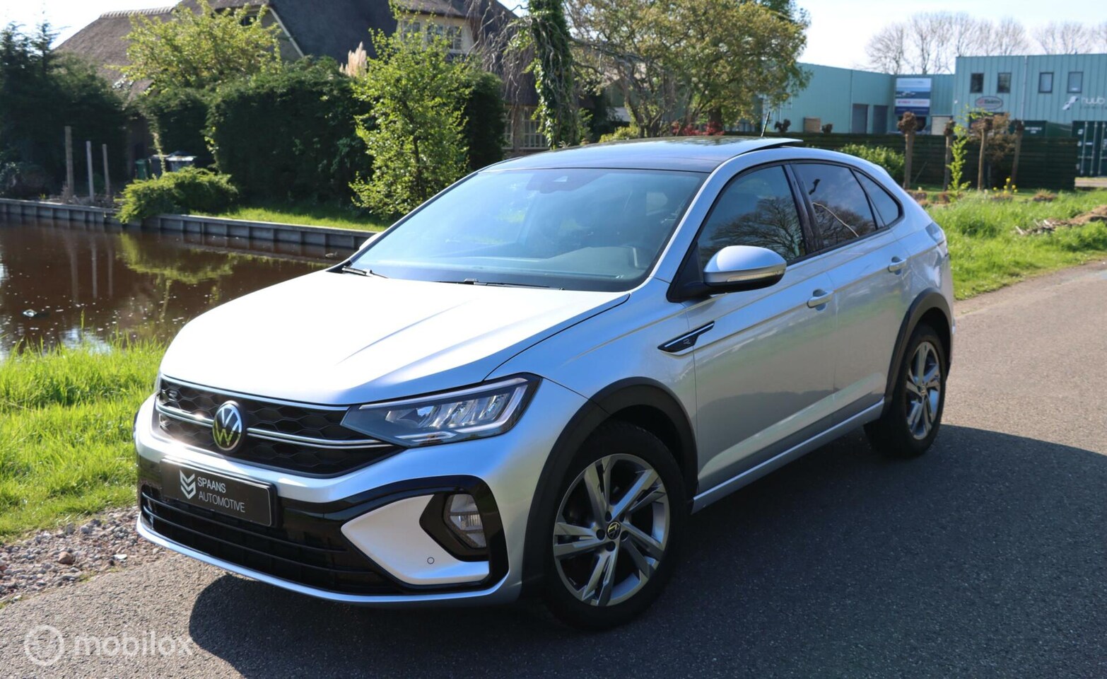 Volkswagen Taigo - 1.0 TSI R-Line / Pano / Navi / Cam / Carpl. - AutoWereld.nl