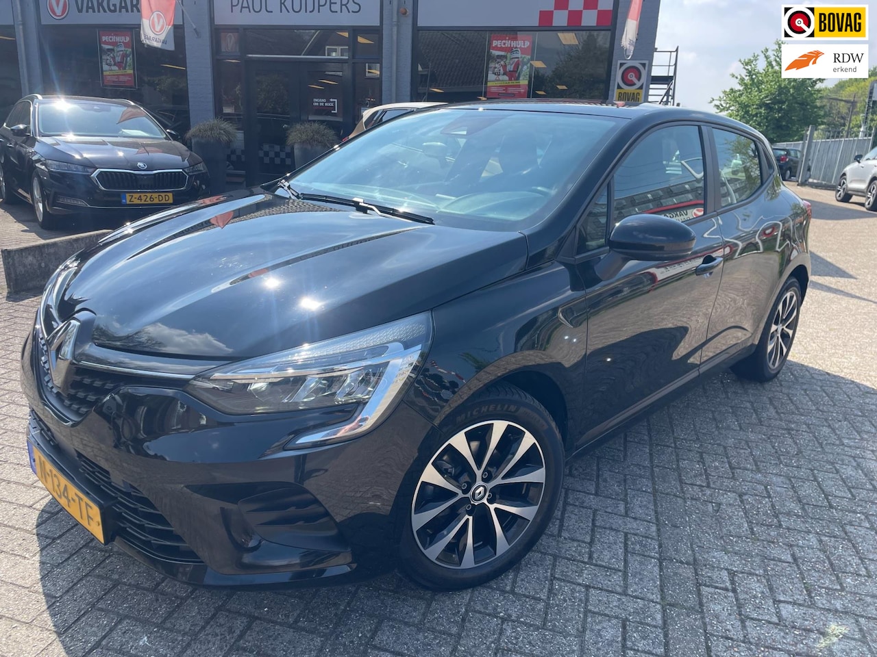 Renault Clio - 1.0 TCe 90PK * airco + navigatie + parkeersensor + 16"LM velgen* - AutoWereld.nl