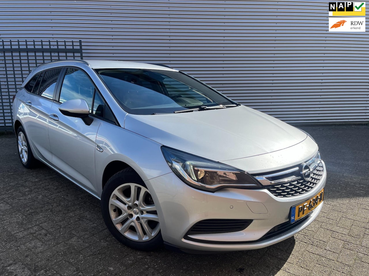 Opel Astra Sports Tourer - 1.0 Online Edition|Navi|Carplay|Camera|PDC|Airco|Cruise| - AutoWereld.nl