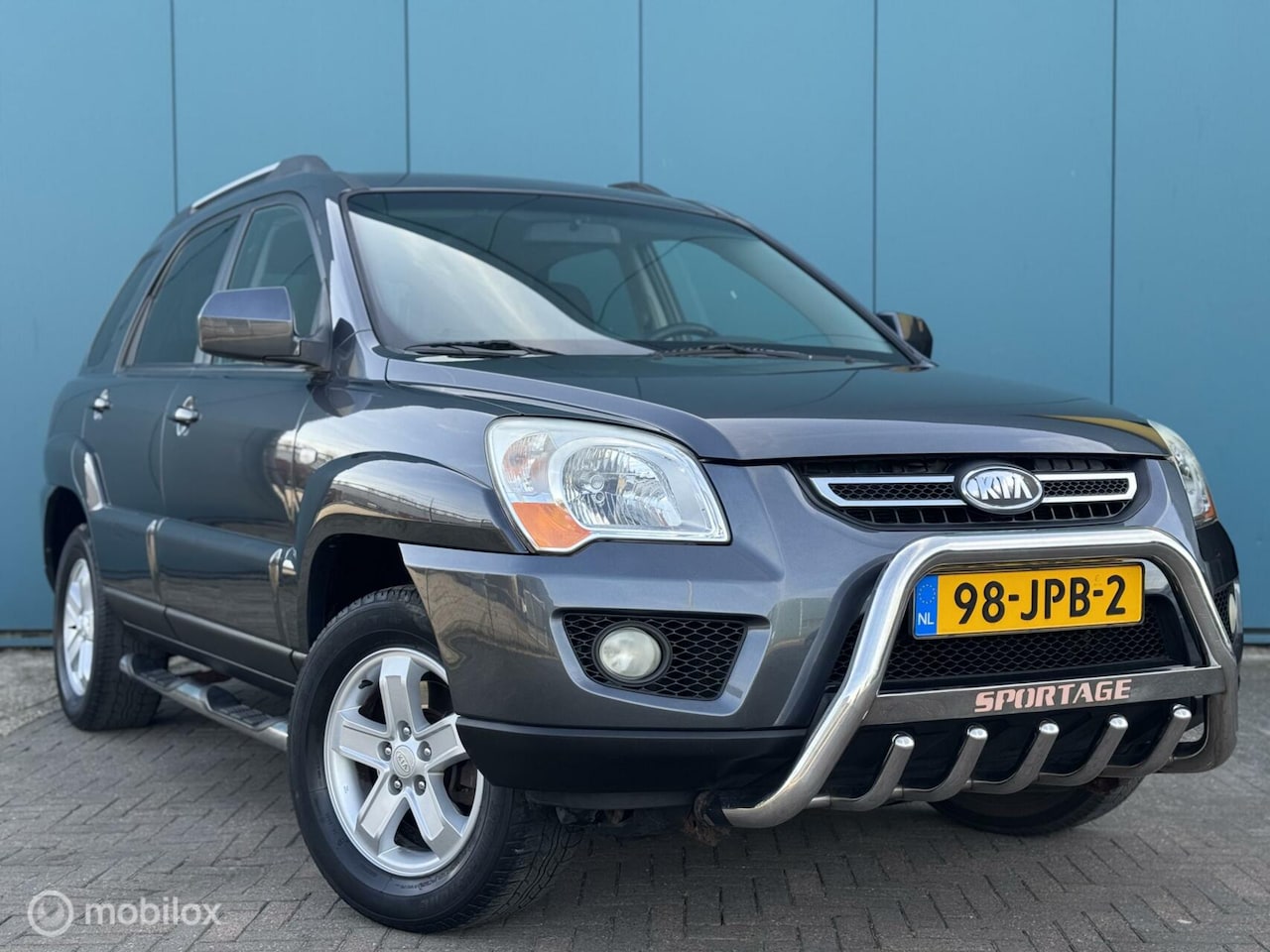 Kia Sportage - 2.0 CVVT X-tra Airco Cruise Control Nette Auto - AutoWereld.nl