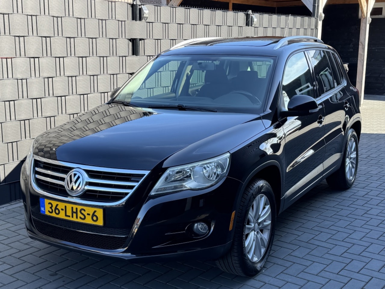 Volkswagen Tiguan - 2.0 TSI Sport&St.4M - AutoWereld.nl