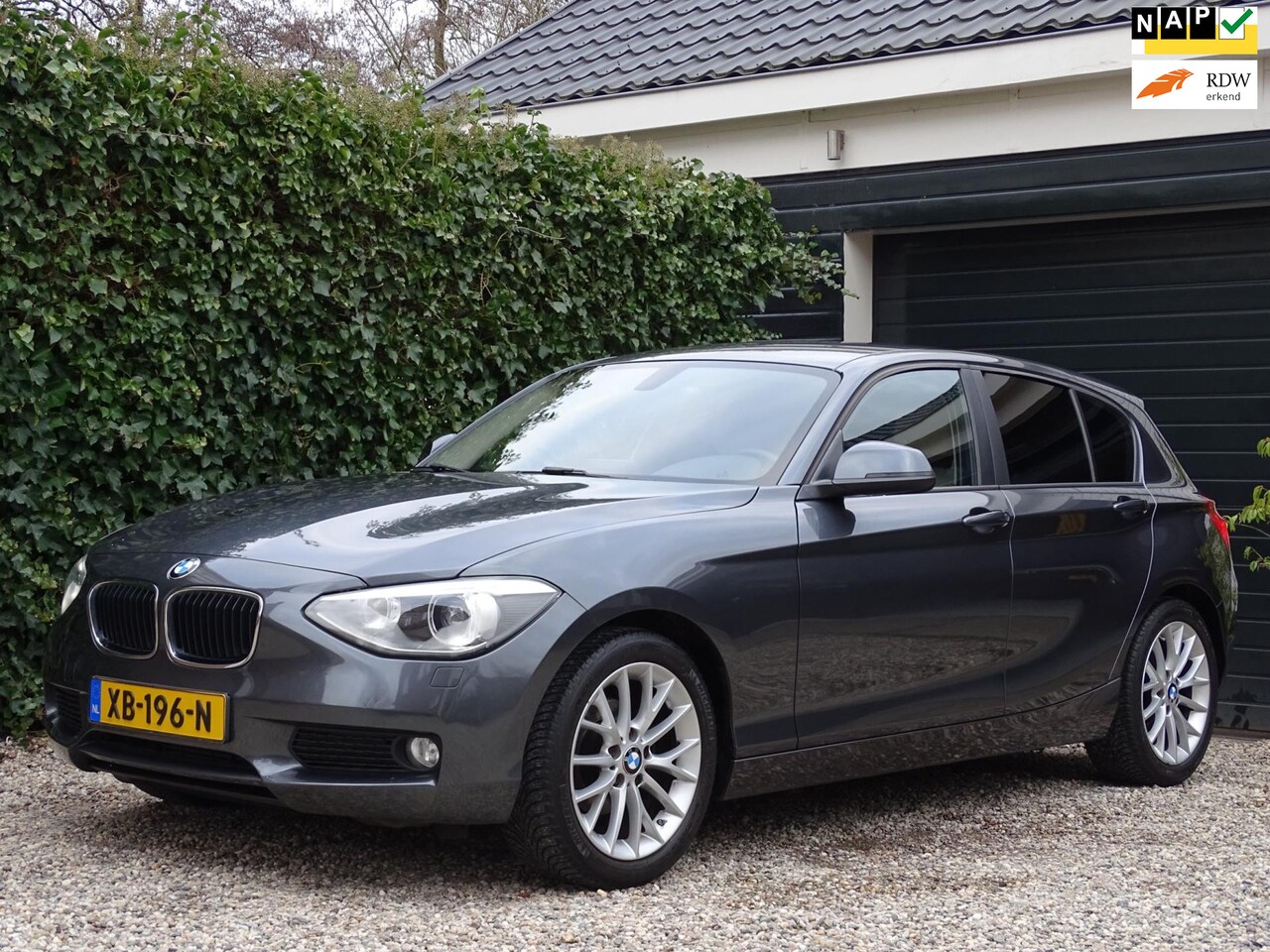 BMW 1-serie - 116i Business+ | Automaat | Navi | Xenon | Stoelverwarming - AutoWereld.nl