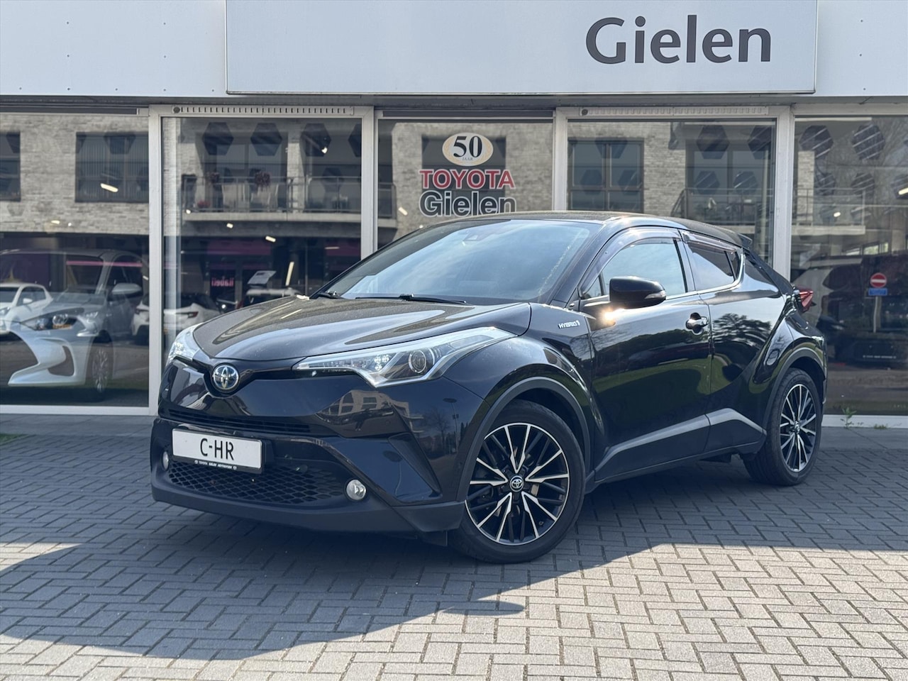 Toyota C-HR - 1.8 Hybrid Executive JBL | Leer, Stoelverwarming, Parkeersensoren, 18 inch, Keyless, Parke - AutoWereld.nl